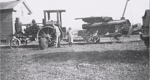 Ina Keesler with her parents on McKenzie Road farm.